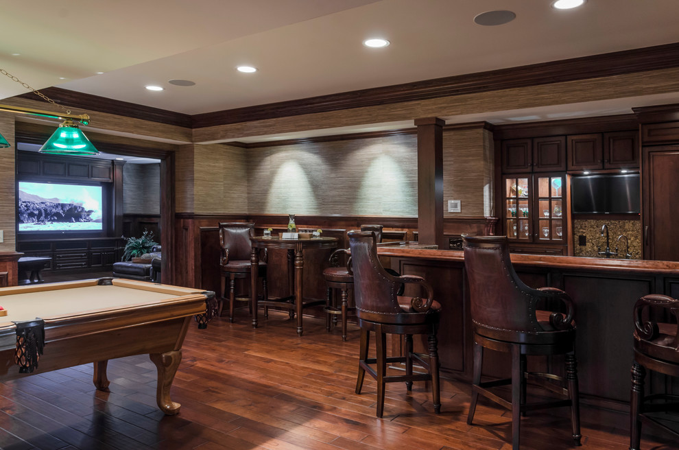 Warm Wood Bar and Media Room Traditional Home Bar Chicago by
