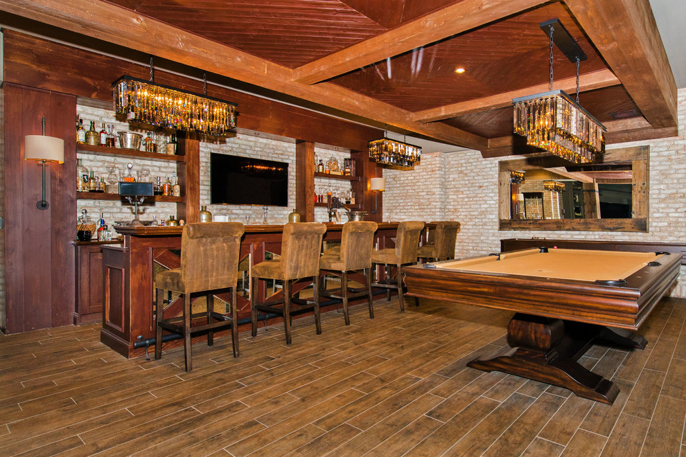 Expansive rustic galley breakfast bar in New York with a built-in sink, open cabinets, wood worktops, beige splashback, stone slab splashback, bamboo flooring, brown floors and dark wood cabinets.