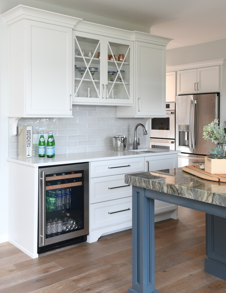 Inspiration for a large nautical home bar in Atlanta with a submerged sink, white cabinets, composite countertops, grey splashback, porcelain splashback, brown floors and yellow worktops.