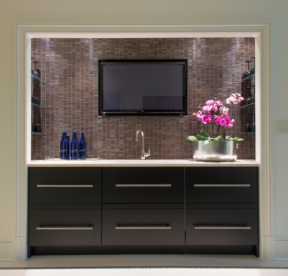 Design ideas for a modern single-wall wet bar in DC Metro with a submerged sink, flat-panel cabinets, black cabinets, marble worktops, black splashback and matchstick tiled splashback.