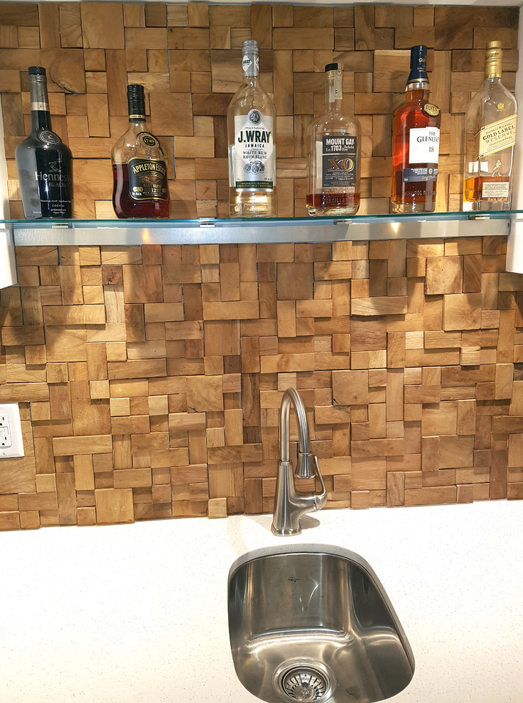 Small trendy galley vinyl floor and brown floor wet bar photo in Toronto with an undermount sink, flat-panel cabinets, white cabinets, quartzite countertops, brown backsplash, wood backsplash and white countertops