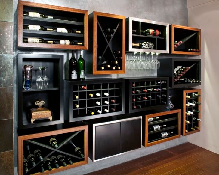 Inspiration for a mid-sized modern medium tone wood floor and brown floor wine cellar remodel in Other