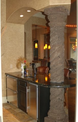 This is an example of a mediterranean home bar in Kansas City.