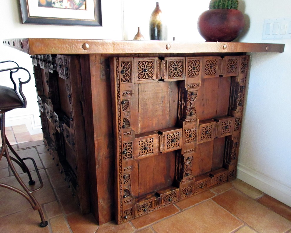 Wood Carving in Mahogany Panels and Copper Countertop on Bar