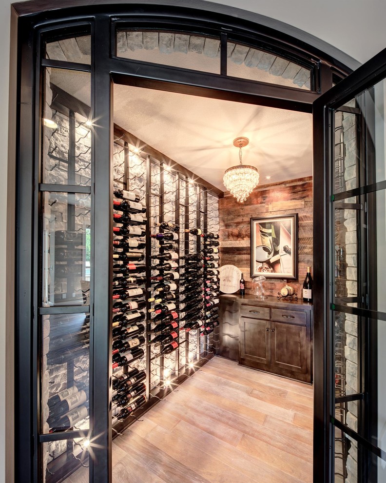 Inspiration for a timeless wine cellar remodel in Kansas City