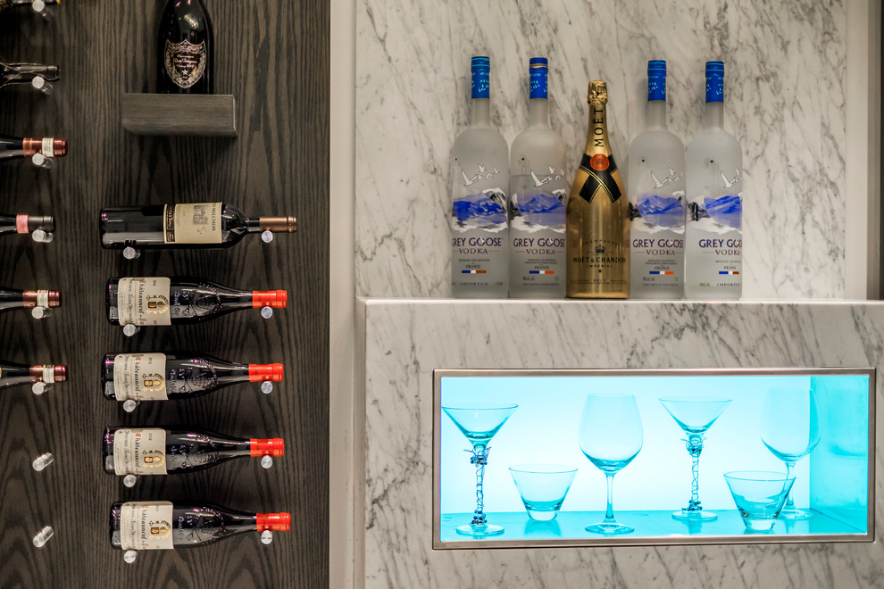 Inspiration for a contemporary single-wall home bar in Vancouver with open cabinets, marble worktops and stone slab splashback.