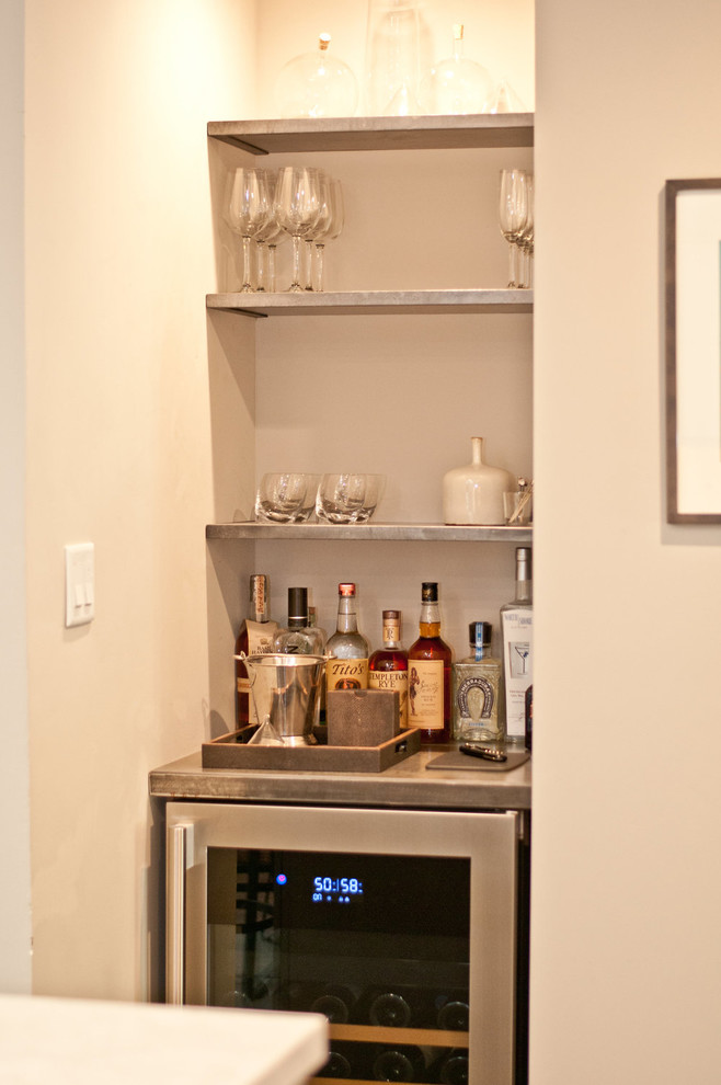 Inspiration for a small urban single-wall wet bar in San Francisco with no sink, concrete worktops and grey worktops.