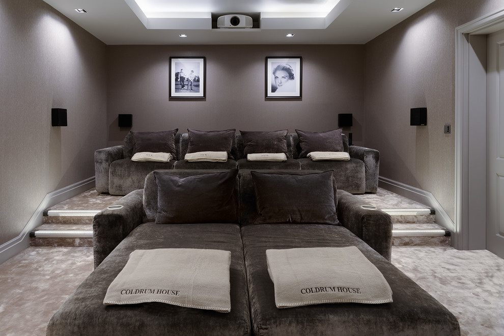 Example of a transitional home theater design in Kent