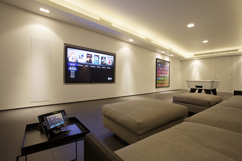 Example of a trendy home theater design in London