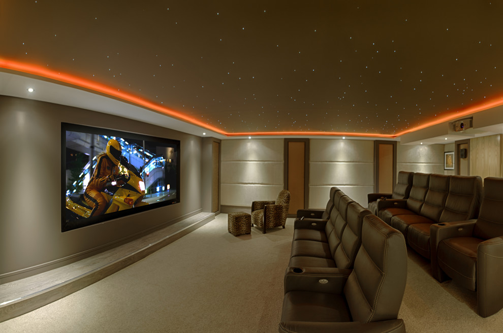Contemporary enclosed home cinema in Berkshire with beige floors.