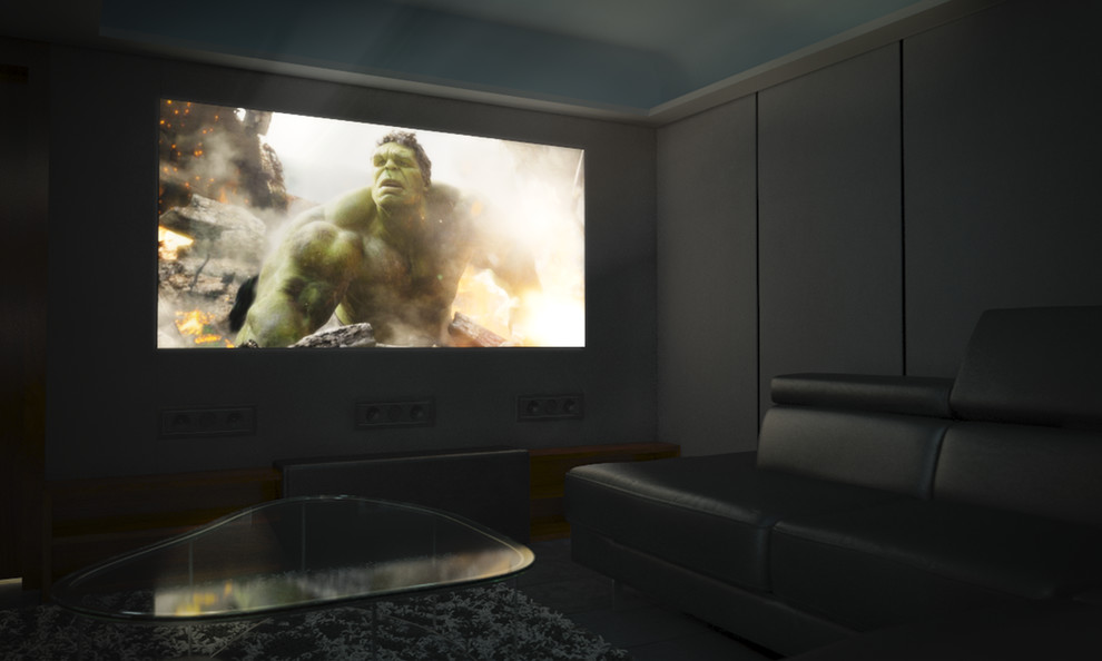Aménagement d'une grande salle de cinéma moderne ouverte avec un mur gris, un sol en ardoise et un écran de projection.