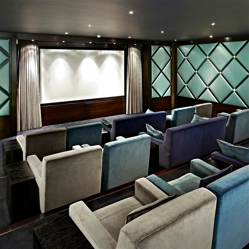 Contemporary enclosed home cinema in London with blue walls and a projector screen.