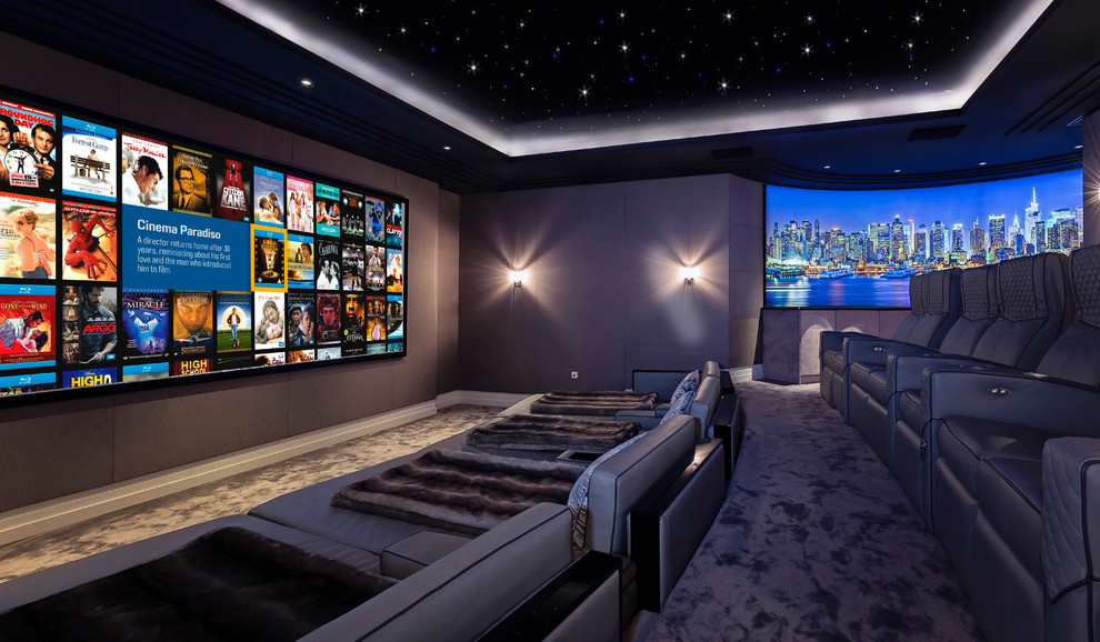 Photo of a large contemporary enclosed home cinema in Berkshire with brown walls, carpet, grey floors and a projector screen.