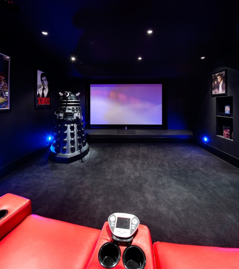 Example of a trendy home theater design in Glasgow
