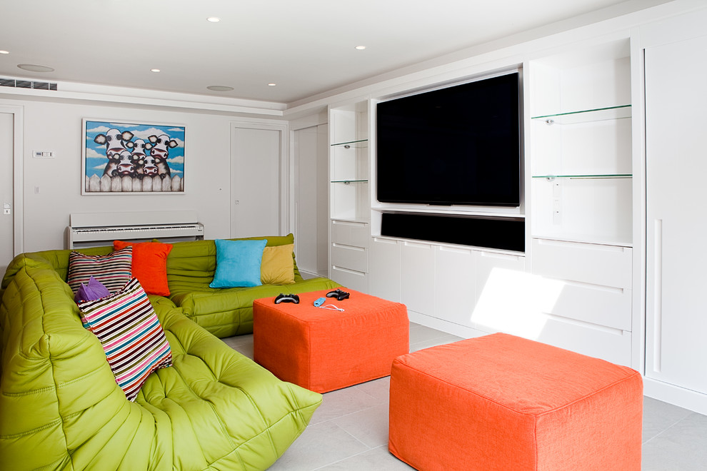 Contemporary home cinema in London with white walls.