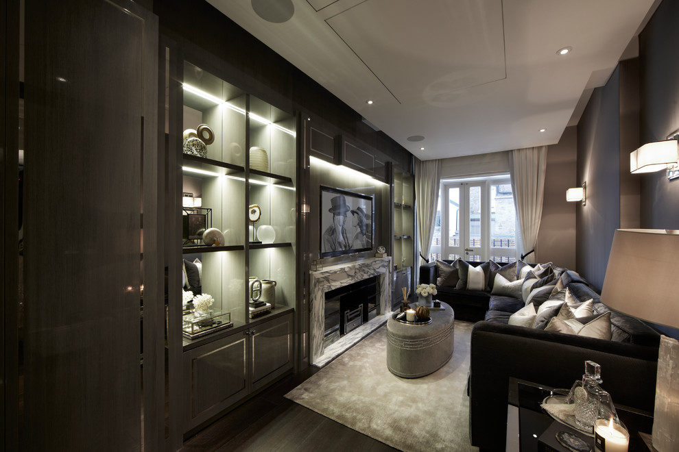 Design ideas for a contemporary home cinema in London with dark hardwood flooring and a built-in media unit.