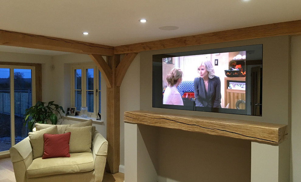 Design ideas for a traditional home cinema in Surrey.