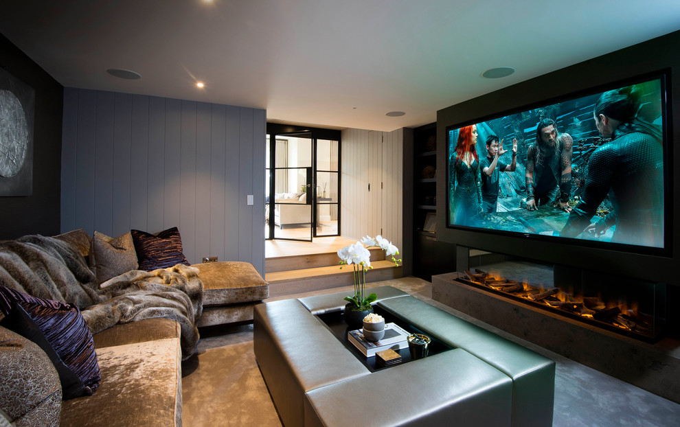 Photo of a contemporary home cinema in Manchester.