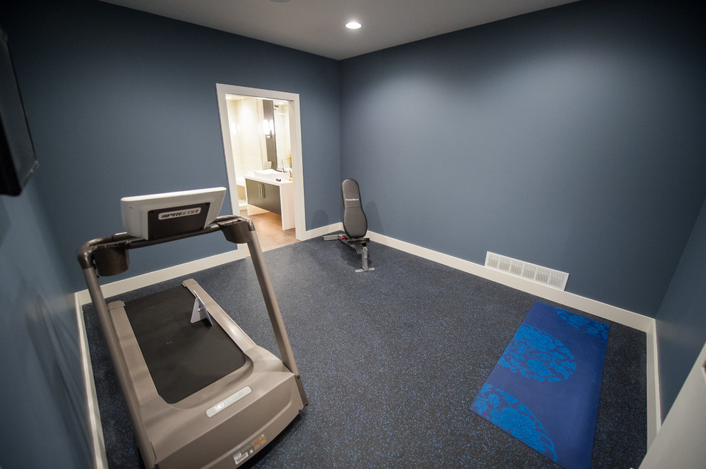 Inspiration for a mid-sized modern multiuse home gym remodel in Cleveland with blue walls