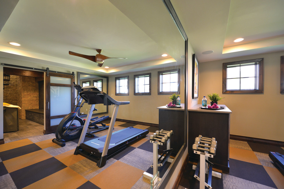 Photo of a contemporary home gym in Detroit.