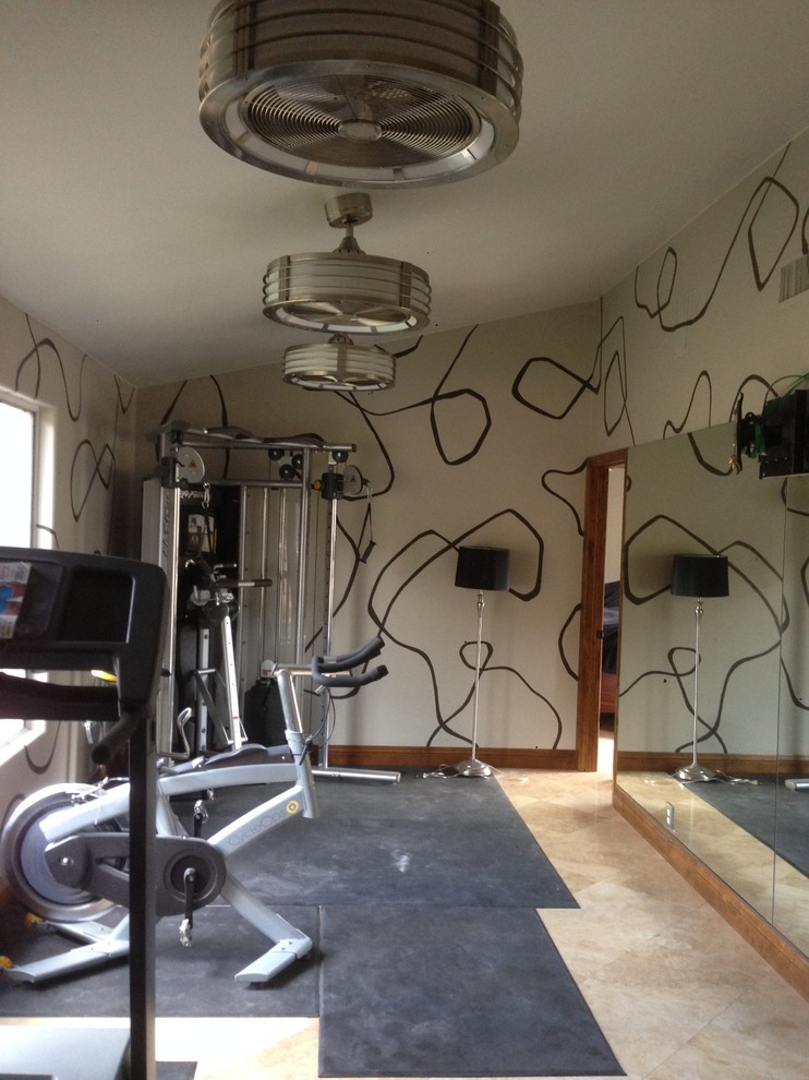 Mid-sized trendy travertine floor multiuse home gym photo in San Diego with beige walls