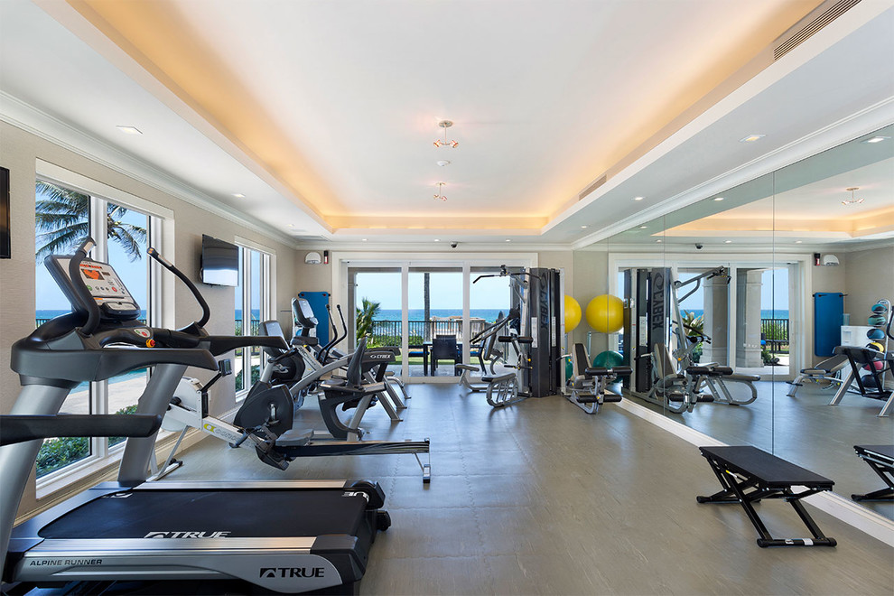 Multiuse home gym - mid-sized coastal linoleum floor and gray floor multiuse home gym idea in Miami with beige walls