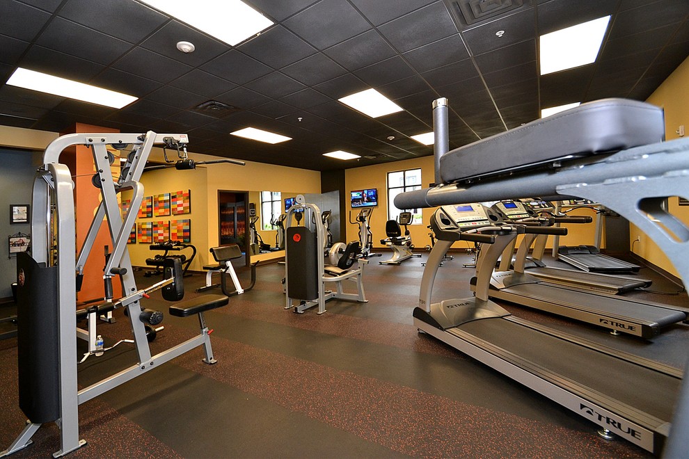 Design ideas for a contemporary home gym in Charlotte.