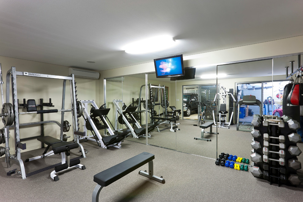 Example of a large minimalist multiuse home gym design in Perth