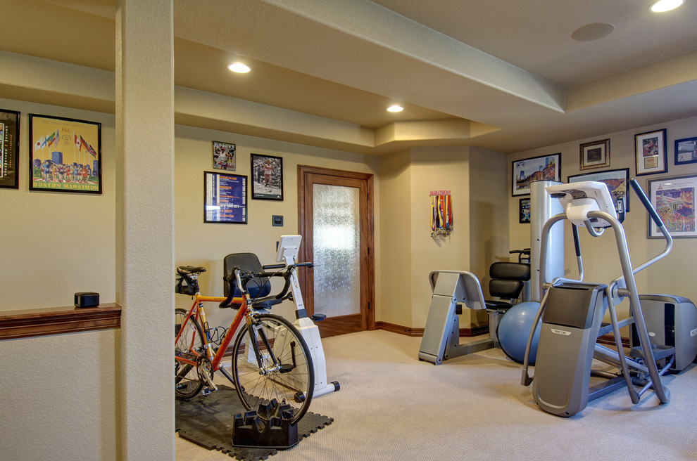 Multiuse home gym - mid-sized traditional carpeted and gray floor multiuse home gym idea in Denver with beige walls