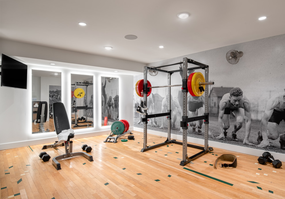 Home gym - contemporary light wood floor and beige floor home gym idea in Atlanta with gray walls