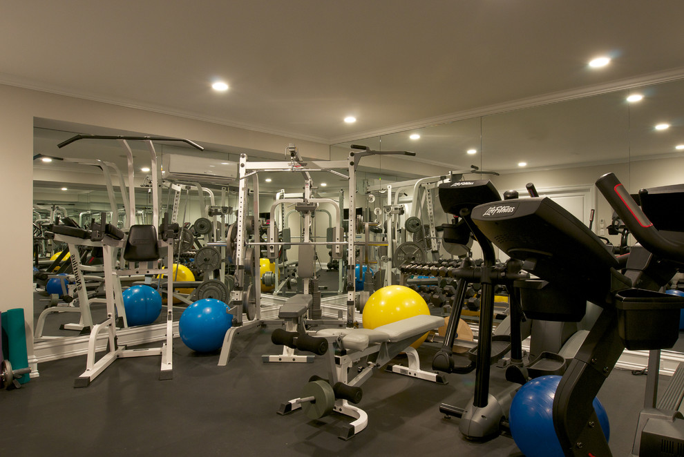 Medium sized classic home weight room in Bridgeport with beige walls, lino flooring and grey floors.