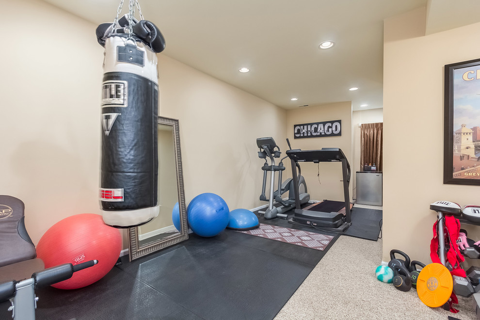 Multiuse home gym - mid-sized traditional carpeted and beige floor multiuse home gym idea in Chicago with beige walls