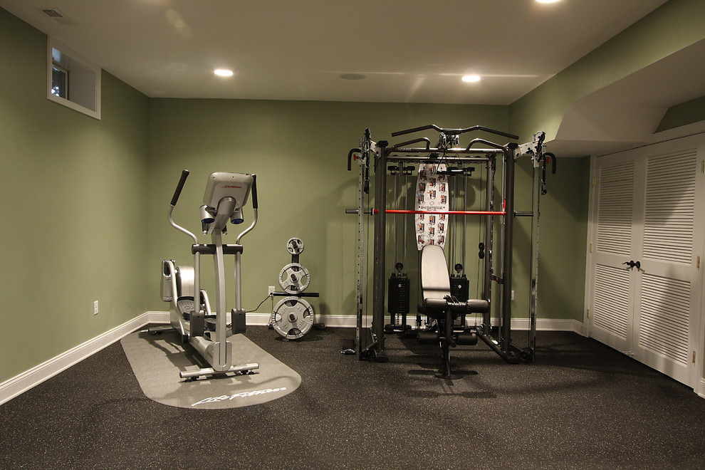 Classic home gym in DC Metro with black floors.
