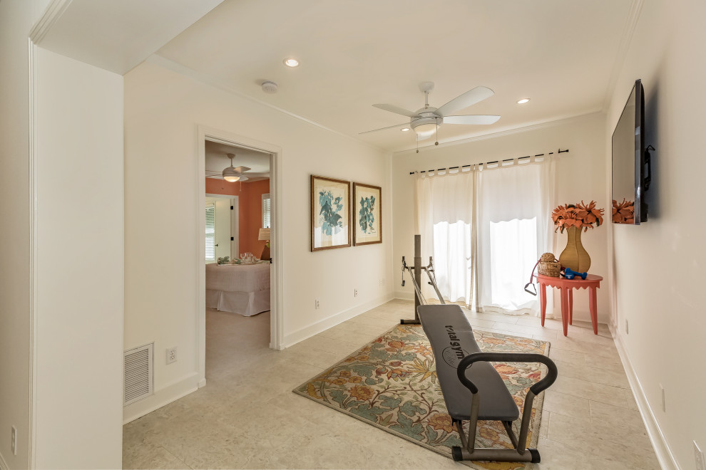 Design ideas for a small bohemian multi-use home gym in Tampa with white walls, travertine flooring and beige floors.