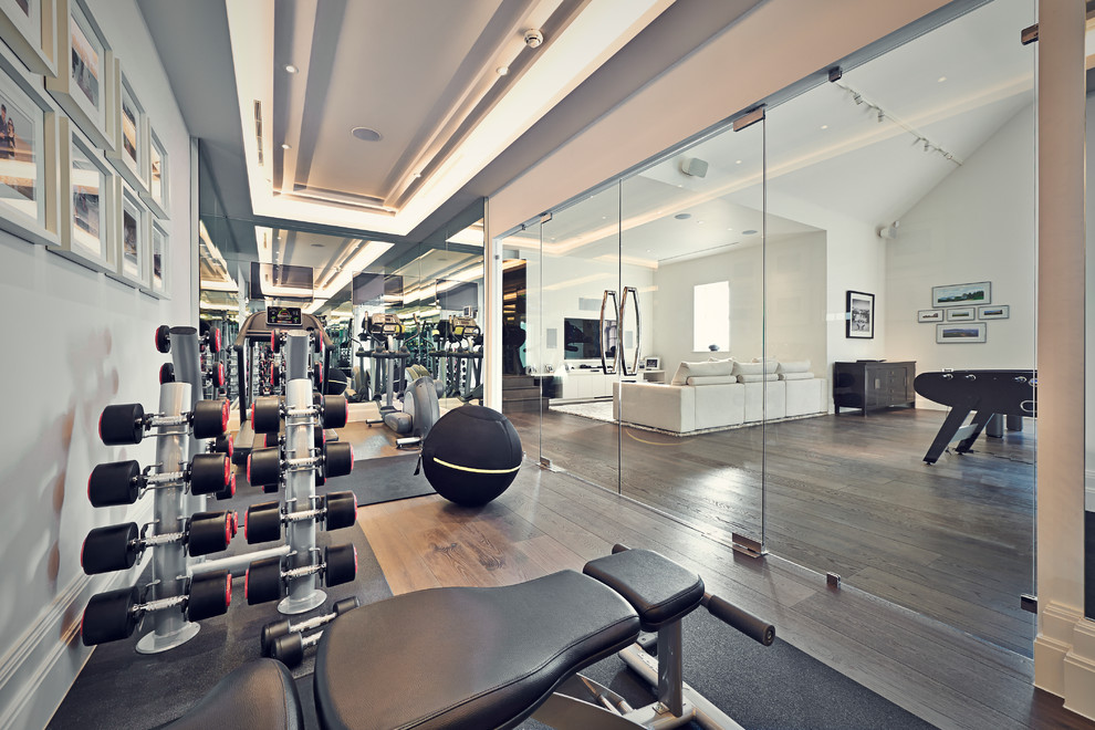 Photo of a contemporary home gym in Surrey.