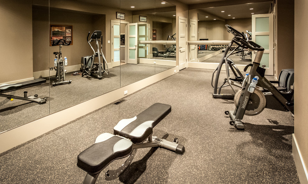 Example of a transitional home gym design in Portland