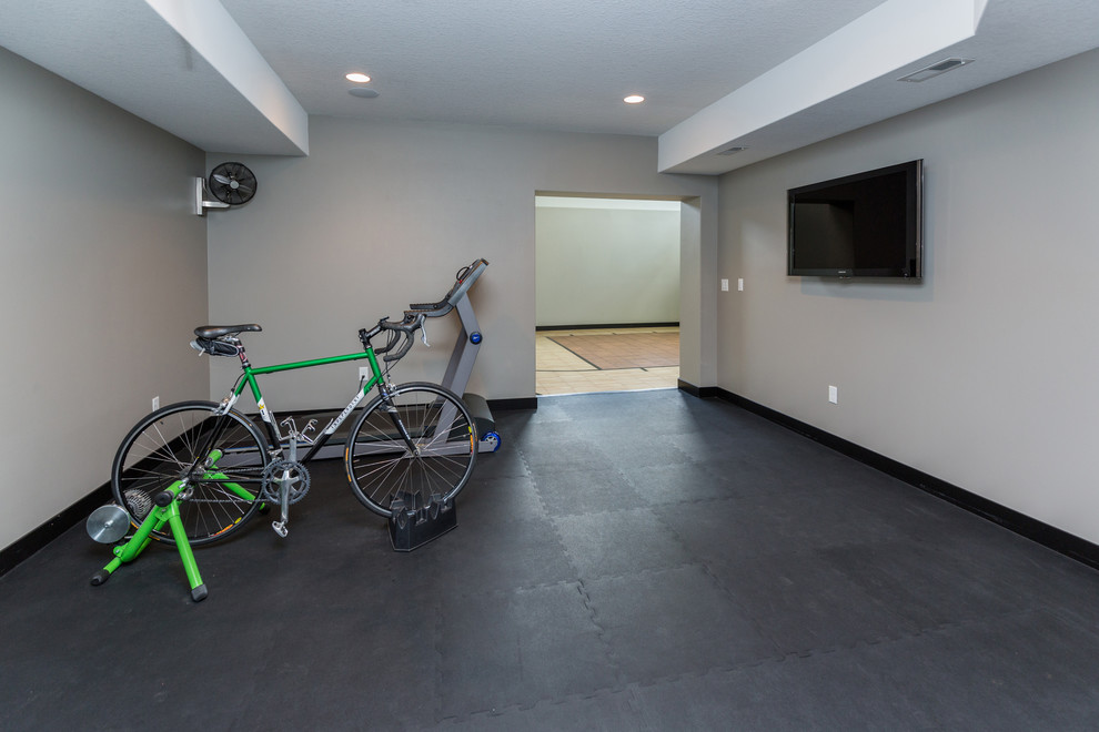 Mid-sized transitional gray floor multiuse home gym photo in Other with gray walls