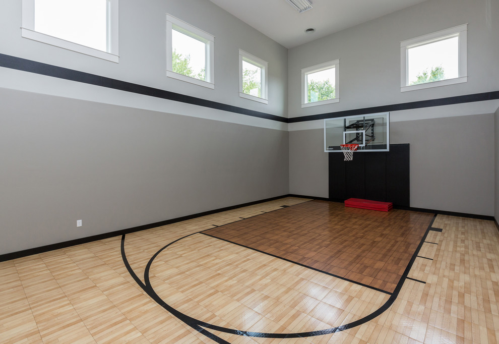 Inspiration for a medium sized classic indoor sports court in Other with grey walls.