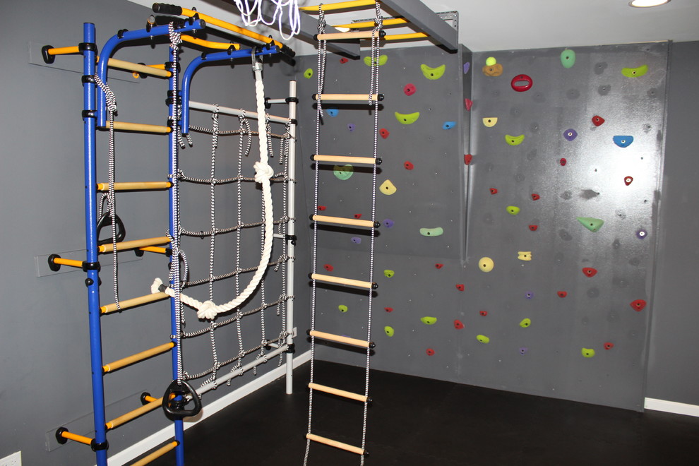 Idee per una parete da arrampicata tradizionale di medie dimensioni con pareti grigie e pavimento in sughero
