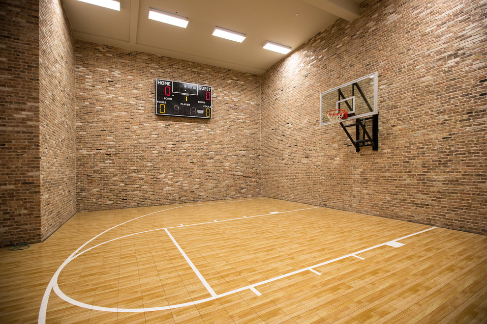 Classic indoor sports court in Dallas with light hardwood flooring.