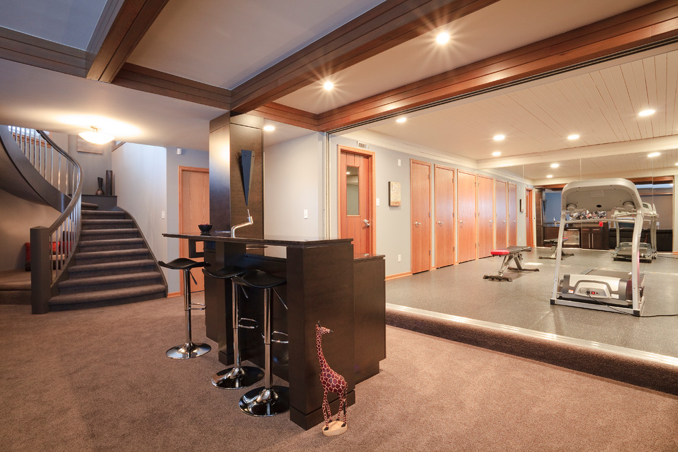 Example of a large trendy cork floor home weight room design in Other