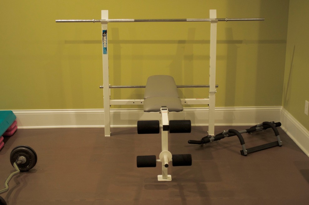 Photo of a traditional home gym in Indianapolis with green walls.