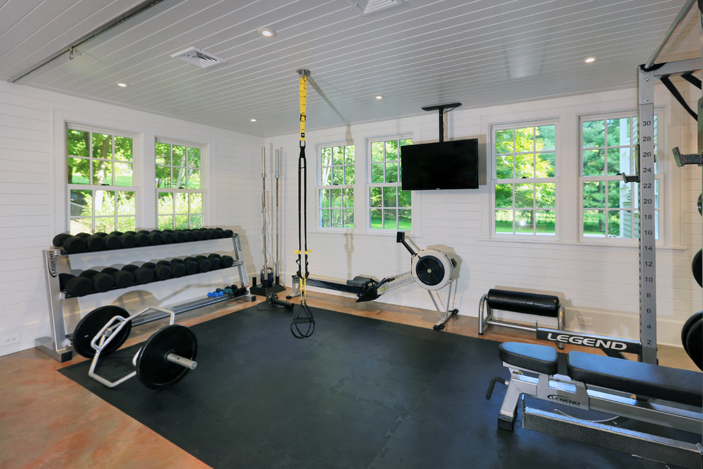 Inspiration for a mid-sized timeless concrete floor home gym remodel in New York with white walls