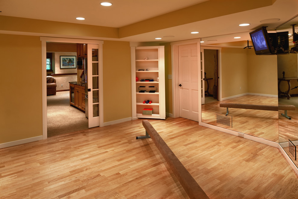 Example of a transitional home gym design in Minneapolis