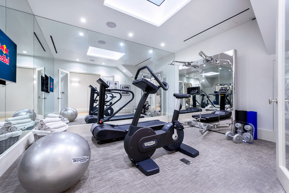 Inspiration for a large contemporary home gym in London.