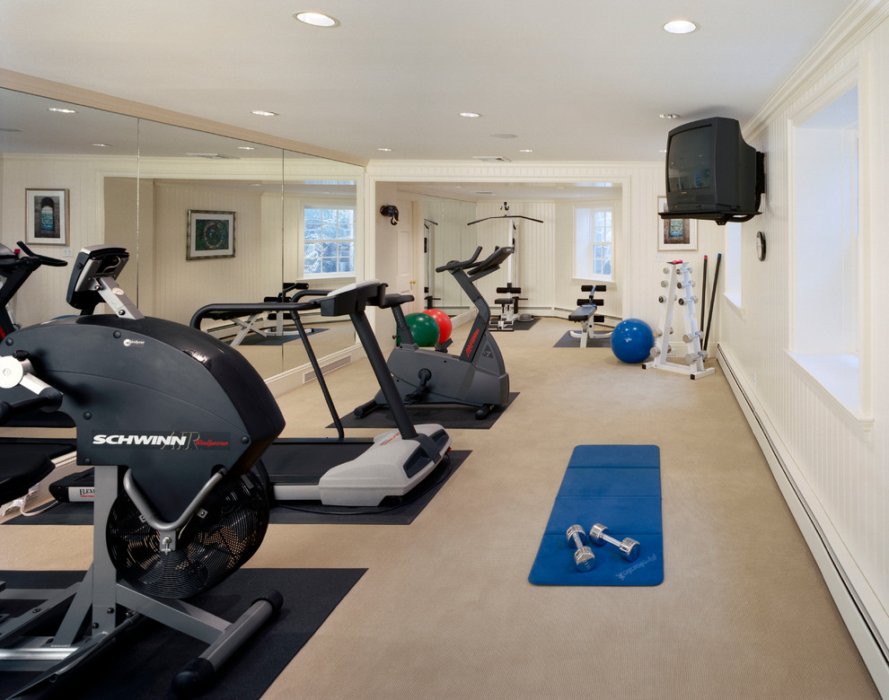 Design ideas for a traditional multi-use home gym in New York with white walls and carpet.