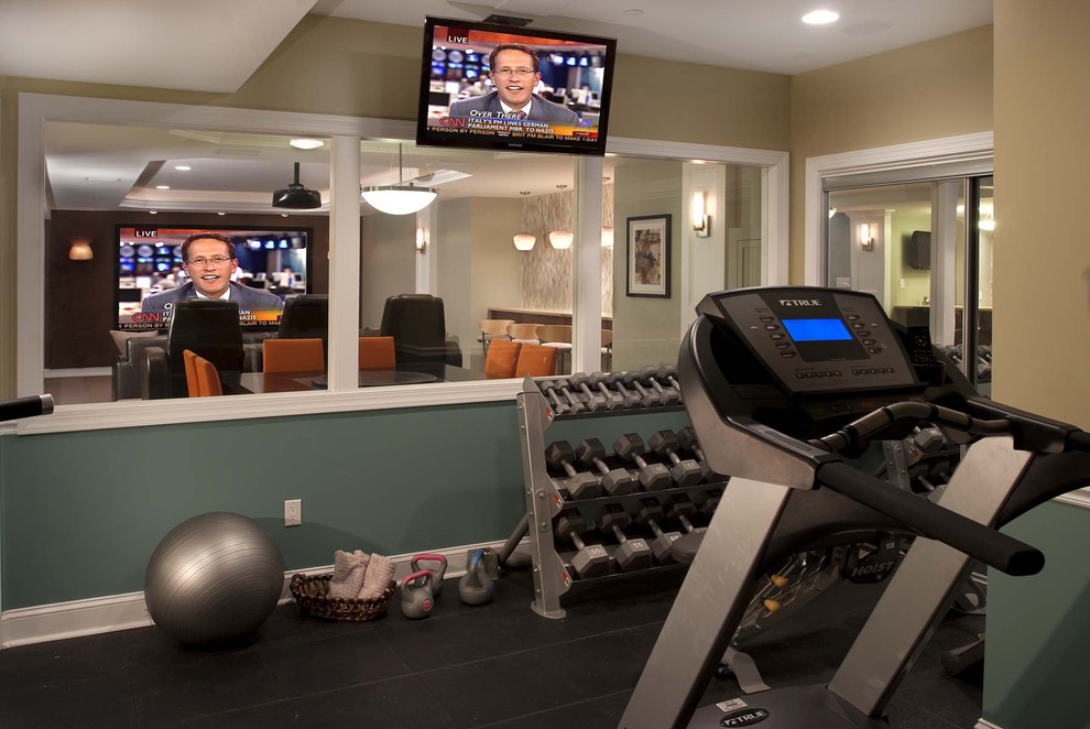 Design ideas for a large contemporary multi-use home gym in Philadelphia with multi-coloured walls and black floors.