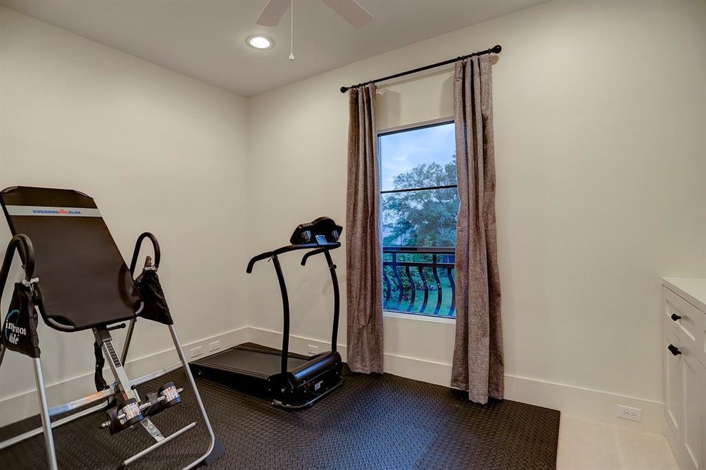Design ideas for a large traditional multi-use home gym in Houston with white walls, brick flooring and white floors.