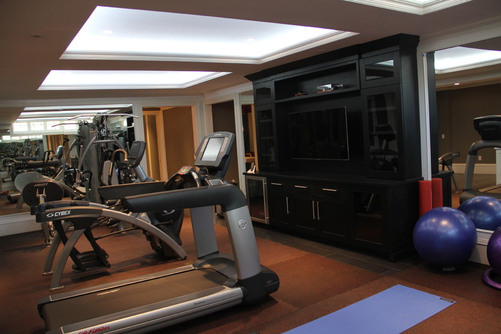 Photo of a contemporary home gym in Boston.