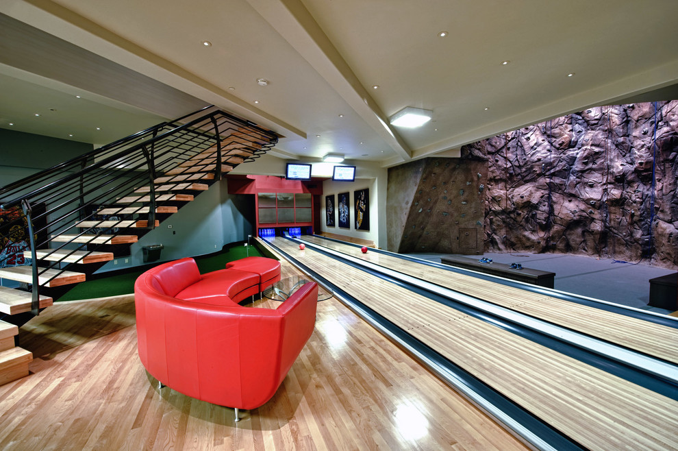 Design ideas for an expansive classic home climbing wall in Salt Lake City with beige walls and light hardwood flooring.